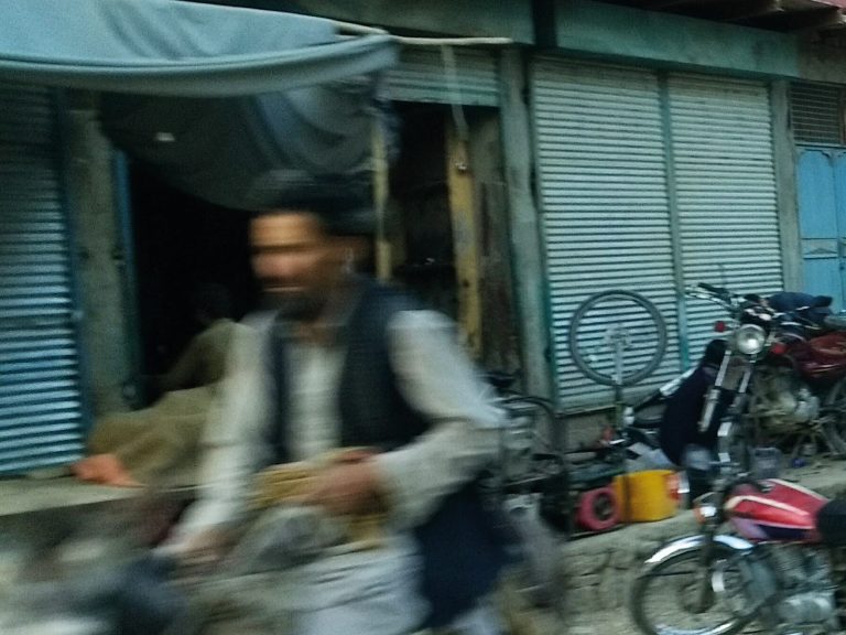 web Man on street in Afghanistan