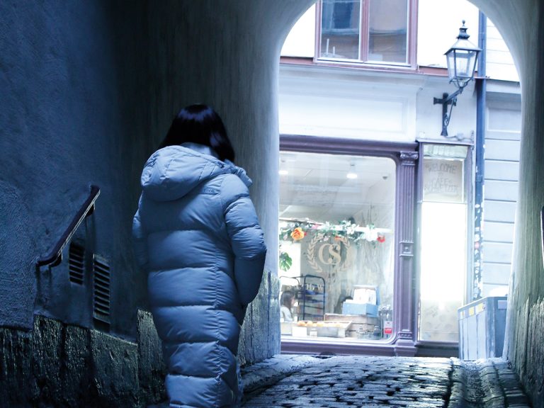 Woman walking up stairs